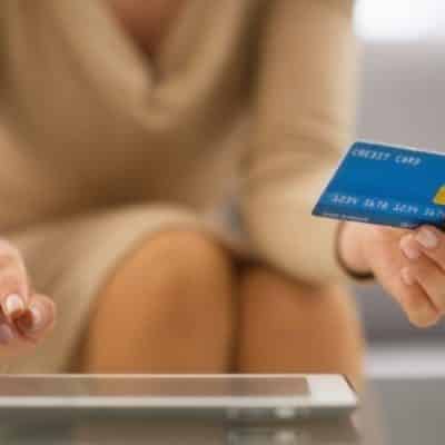 how do credit card companies make money