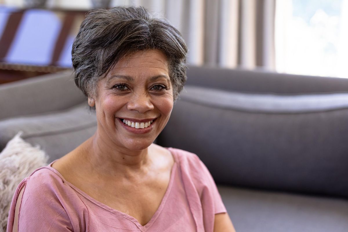 Senior woman sitting on a couch